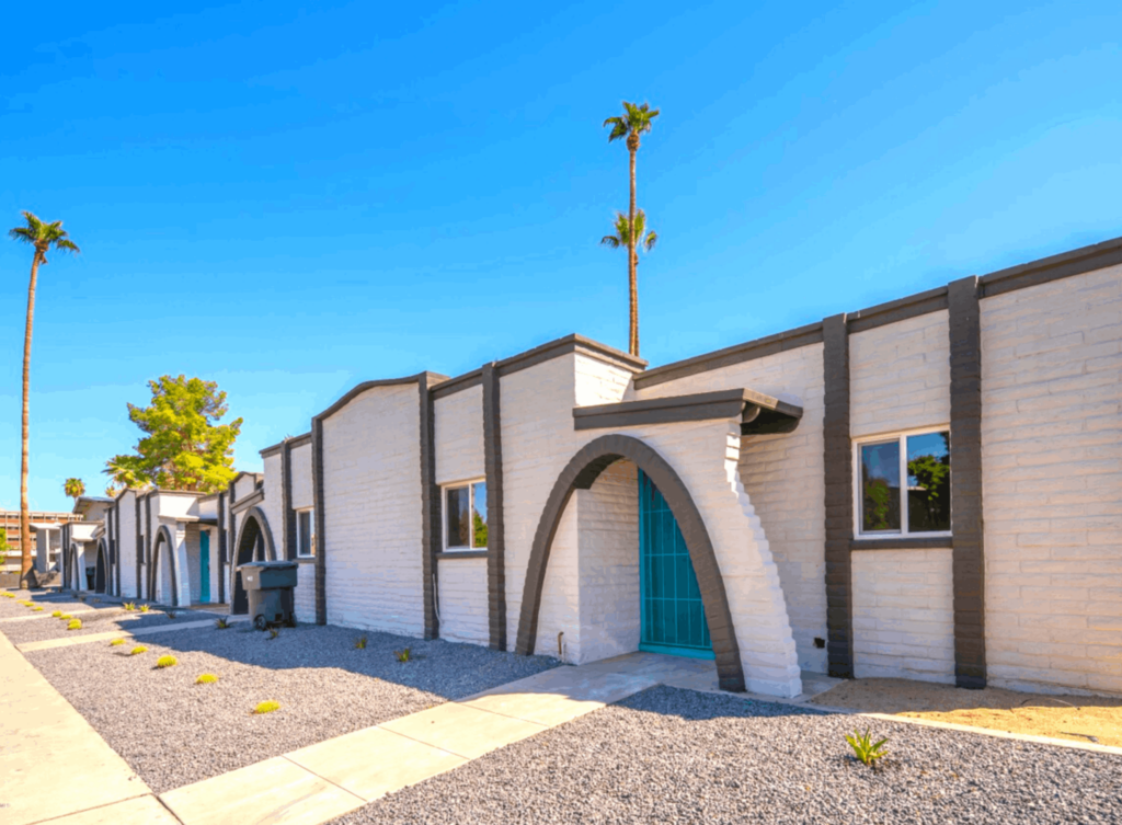 Apartment buildings with desert landscaping nd palm trees